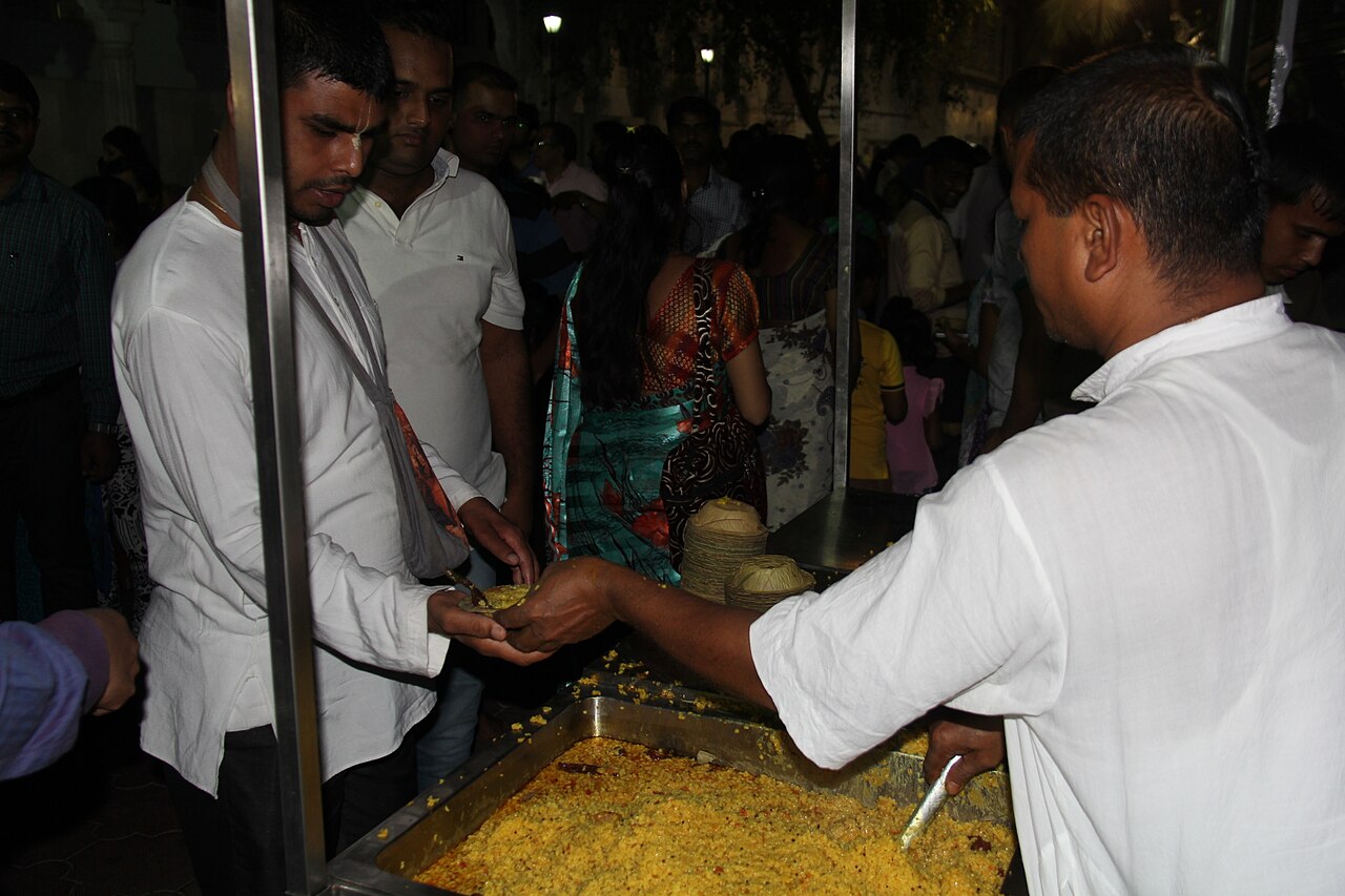 Prasadam being served to villagers and guests